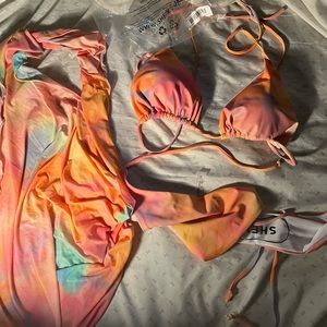 Multicolor swimwear very trendy and sexy attire .